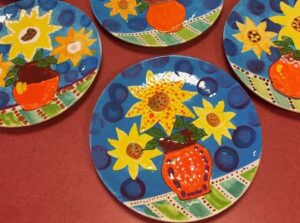 Plates made in pottery class at kids party